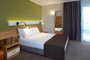 Postel nebo postele na pokoji v ubytování Hotel Aktinia - All Inclusive
