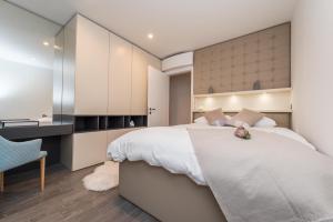 Posteľ alebo postele v izbe v ubytovaní Luxury Apartment Kortina