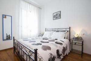 Llit o llits en una habitació de La Dimora di Checchino