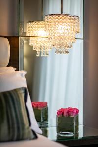 Voodi või voodid majutusasutuse Zuni Restaurant & Boutique Hotel toas