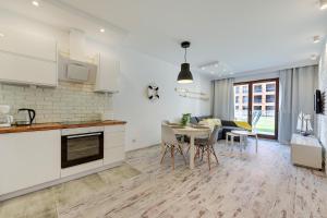 O bucătărie sau chicinetă la Aura Island Apartments Old Town