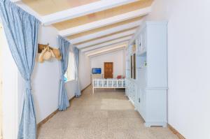 A bed or beds in a room at Can Rosito