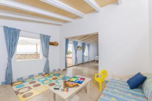 A bed or beds in a room at Can Rosito
