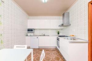 A kitchen or kitchenette at Can Rosito