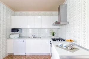 A kitchen or kitchenette at Can Rosito
