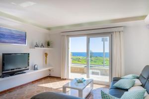 A television and/or entertainment centre at Can Rosito