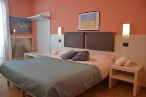 Cama ou camas em um quarto em Affittacamere Porticciolo