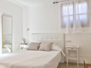Postel nebo postele na pokoji v ubytování Can Moragues de Soller