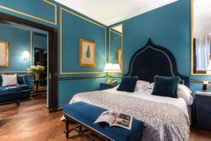 Łóżko lub łóżka w pokoju w obiekcie Splendid Venice - Starhotels Collezione