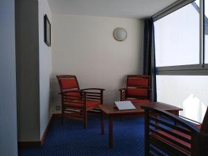 Posezení v ubytování Hotel De La Mer