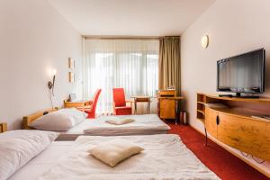 Un pat sau paturi într-o cameră la Hotel SET