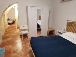 Postel nebo postele na pokoji v ubytování Iblea Paradise