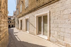 an empty alley in an old stone building at Apartment DeLux in Split