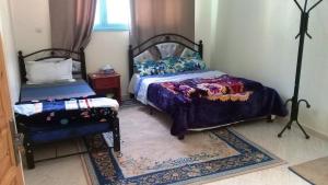 Postel nebo postele na pokoji v ubytování Azur Tafraout