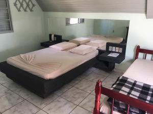 Postel nebo postele na pokoji v ubytování Hotel Comodoro De Bagé