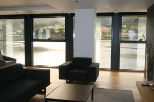 Posezení v ubytování Hotel U Viveiro