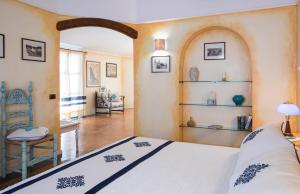 Кровать или кровати в номере Hotel Poseidonia