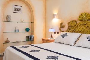 Кровать или кровати в номере Hotel Poseidonia