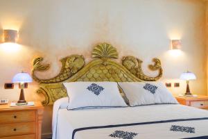 Кровать или кровати в номере Hotel Poseidonia