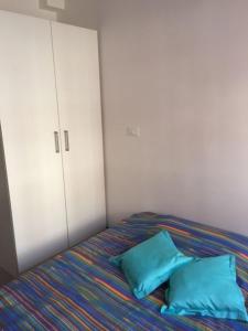 A bed or beds in a room at La stanzia du cavallu