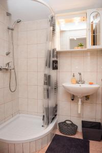 Koupelna v ubytování Apartment Oli