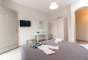 Postel nebo postele na pokoji v ubytování Almiriki Naxos Beachside Living