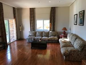 Ein Sitzbereich in der Unterkunft Villa Bella Portbou