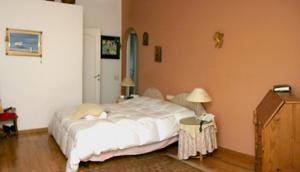 Ein Bett oder Betten in einem Zimmer der Unterkunft Villa Bella Portbou