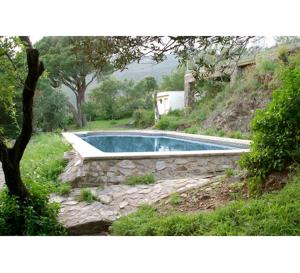 Der Swimmingpool an oder in der Nähe von Villa Bella Portbou