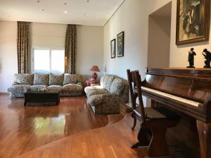 Ein Sitzbereich in der Unterkunft Villa Bella Portbou