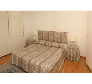 Ein Bett oder Betten in einem Zimmer der Unterkunft Villa Bella Portbou