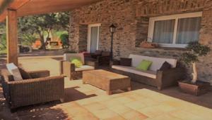 Ein Sitzbereich in der Unterkunft Villa Bella Portbou