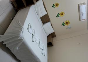 Cama o camas de una habitación en Hotel Mirante Da Ilha