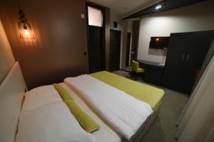Hotel Bavka房間的床