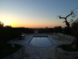 The swimming pool at or close to Trullo Monte Del Sale