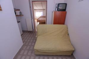 Televízia a/alebo spoločenská miestnosť v ubytovaní Villa Radojka