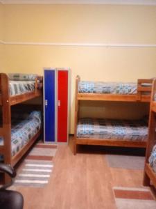 Cama ou camas em um quarto em Hostal Arenas del Mar