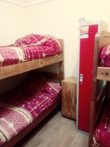 Cama ou camas em um quarto em Hostal Arenas del Mar