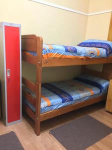 Cama ou camas em um quarto em Hostal Arenas del Mar