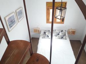 Łóżko lub łóżka w pokoju w obiekcie CH Apartments