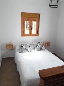 Łóżko lub łóżka w pokoju w obiekcie CH Apartments