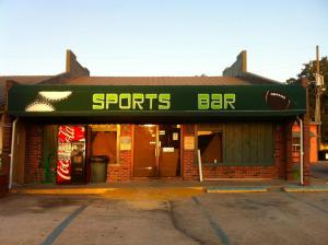 a store front with a sports bar sign on it at Gators Inn on the Bayou in Larose