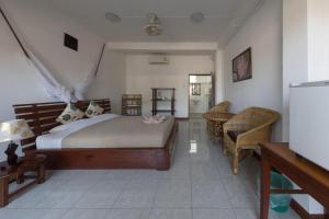 Ein Bett oder Betten in einem Zimmer der Unterkunft BABA Guesthouse