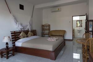 Ein Bett oder Betten in einem Zimmer der Unterkunft BABA Guesthouse
