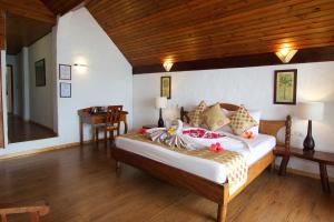 Letto o letti in una camera di Colibri Hotel