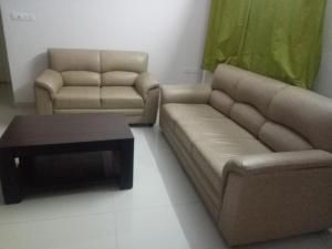 A seating area at Arra Suites