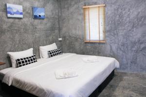Letto o letti in una camera di The Simple Koh Yao Noi