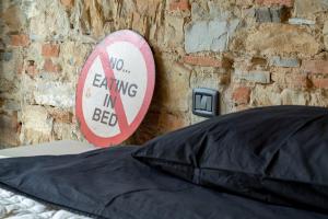 Ein Bett oder Betten in einem Zimmer der Unterkunft The Loft Unique Designed