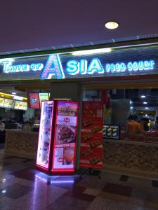 a food court with a sign in front of it at FnF Suite @ Time Square in Kuala Lumpur