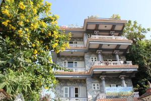 A balcony or terrace at Hotel Grand Holiday